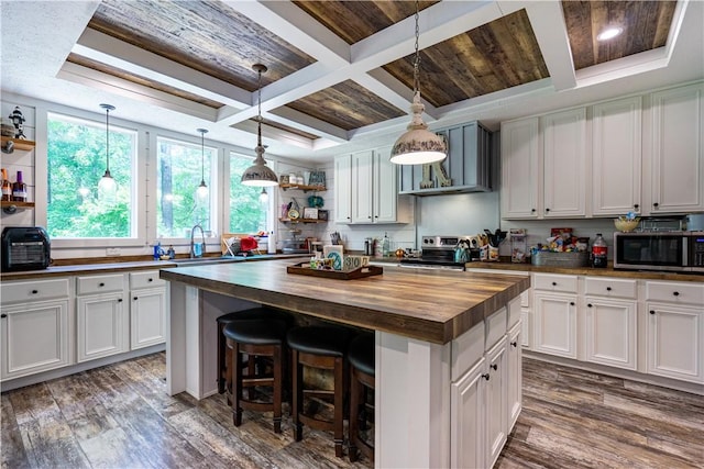 1249 County Road 446, Five Points, AL 36855 - kitchen featuring butcher block counters, appliances with stainless steel finishes, coffered ceiling, a center island, and open shelves