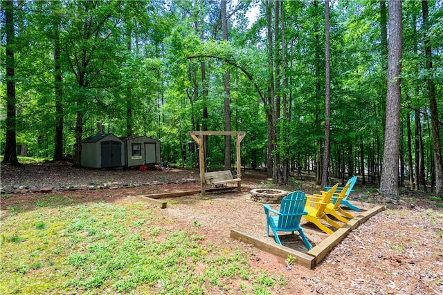 1249 County Road 446, Five Points, AL 36855 - view of yard with an outdoor fire pit and a storage shed