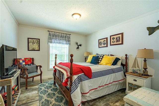 1249 County Road 446, Five Points, AL 36855 - bedroom with dark wood finished floors, ornamental molding, and a textured ceiling