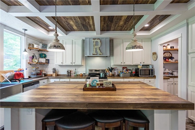 1249 County Road 446, Five Points, AL 36855 - kitchen featuring butcher block countertops, open shelves, appliances with stainless steel finishes, coffered ceiling, and extractor fan
