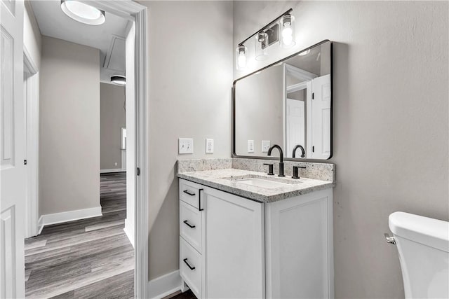 1661 S Camden Ct, Auburn, AL 36830 - bathroom featuring wood finished floors and vanity