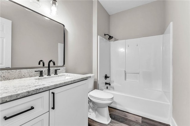 1661 S Camden Ct, Auburn, AL 36830 - bathroom with wood finished floors, vanity, and  shower combination