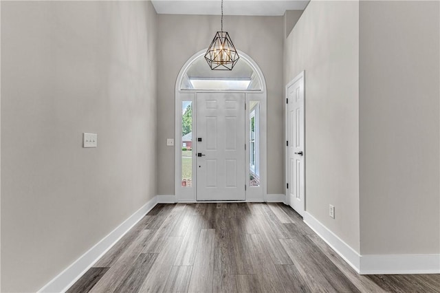1661 S Camden Ct, Auburn, AL 36830 - foyer entrance featuring dark wood-type flooring and a chandelier