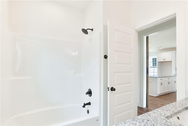 112 Hunters Way, Opelika, AL 36801 - full bath with vanity, shower / washtub combination, and wood finished floors