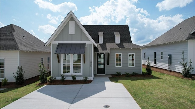 112 Hunters Way, Opelika, AL 36801 - modern inspired farmhouse featuring board and batten siding, roof with shingles, and a front yard