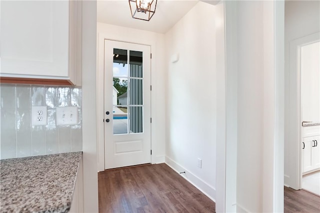 112 Hunters Way, Opelika, AL 36801 - doorway to outside with dark wood-type flooring and baseboards
