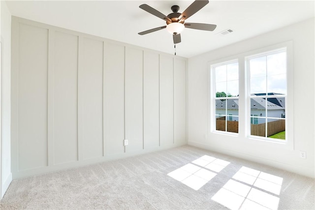 112 Hunters Way, Opelika, AL 36801 - carpeted empty room featuring a decorative wall and a ceiling fan