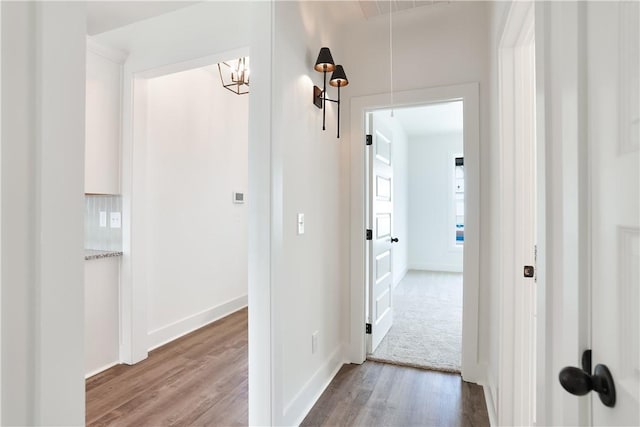 112 Hunters Way, Opelika, AL 36801 - hall with wood finished floors, baseboards, and attic access