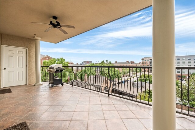 234 W Magnolia Ave Unit 305, Auburn, AL 36830 - balcony featuring ceiling fan and a grill