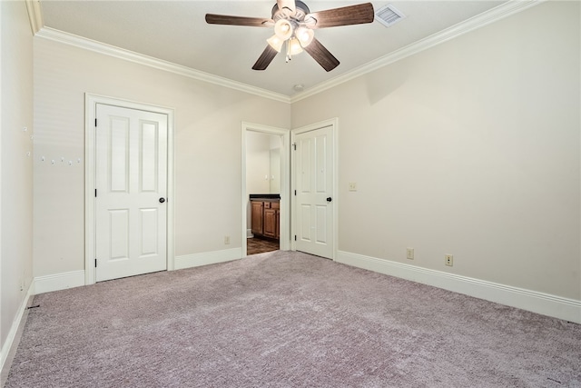 234 W Magnolia Ave Unit 305, Auburn, AL 36830 - unfurnished bedroom featuring crown molding, carpet flooring, baseboards, connected bathroom, and ceiling fan