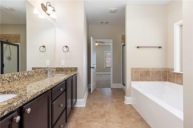 8 Ivy Loop, Phenix City, AL 36867 - full bath with a shower stall, a garden tub, double vanity, ceiling fan, and tile patterned floors