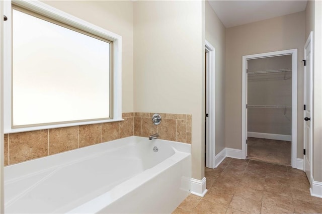 8 Ivy Loop, Phenix City, AL 36867 - bathroom with a garden tub and a spacious closet