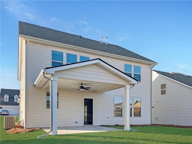 rear view of house featuring central AC, a yard, a patio, and ceiling fan