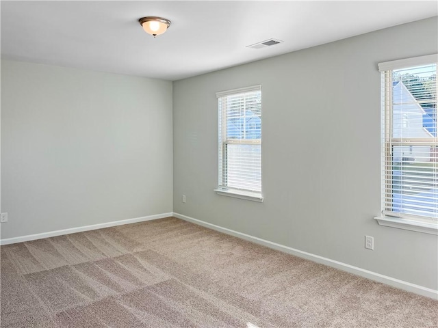 view of carpeted spare room