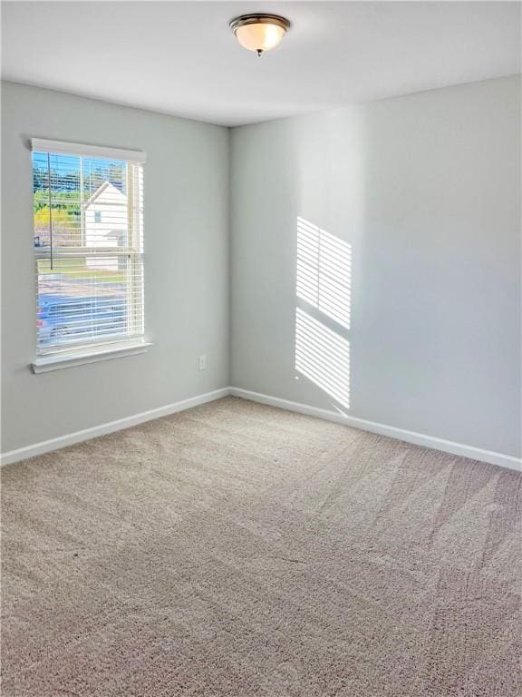 empty room with carpet floors