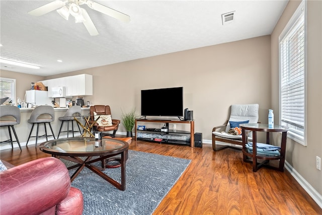 1477 N Donahue Dr Unit 1708, Auburn, AL 36830 - living room with wood finished floors, a ceiling fan, and recessed lighting