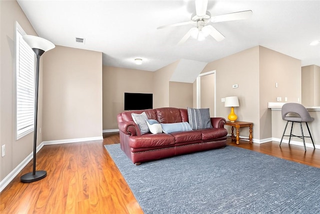 1477 N Donahue Dr Unit 1708, Auburn, AL 36830 - living room featuring wood finished floors and a ceiling fan