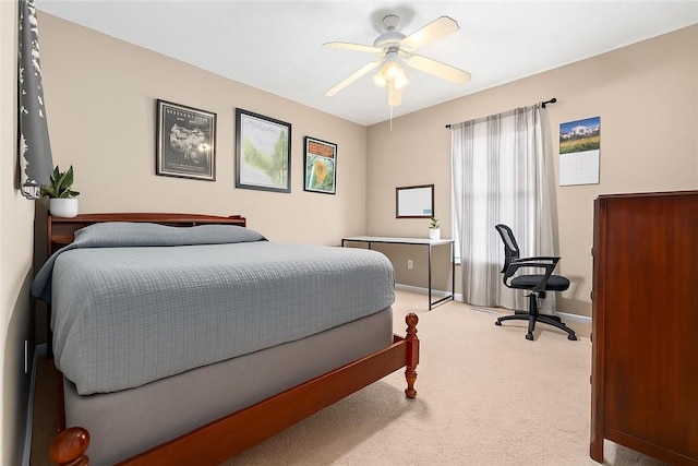 1477 N Donahue Dr Unit 1708, Auburn, AL 36830 - bedroom with light colored carpet and ceiling fan