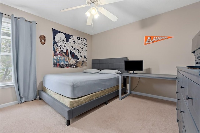 1477 N Donahue Dr Unit 1708, Auburn, AL 36830 - bedroom with light carpet and a ceiling fan