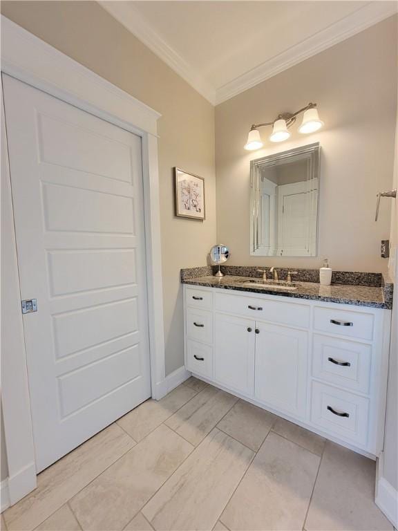 3615 Eagle Nest, Opelika, AL 36801 - bathroom with vanity, baseboards, and ornamental molding