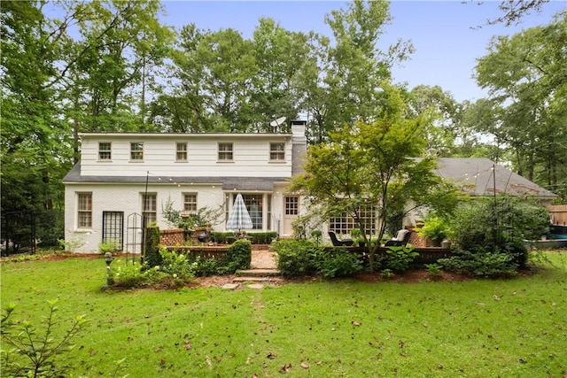 2521 Middle Brook Ln, Auburn, AL 36832 - rear view of property featuring a chimney and brick siding
