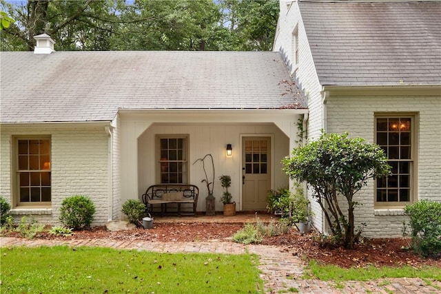 2521 Middle Brook Ln, Auburn, AL 36832 - doorway to property with brick siding and a chimney