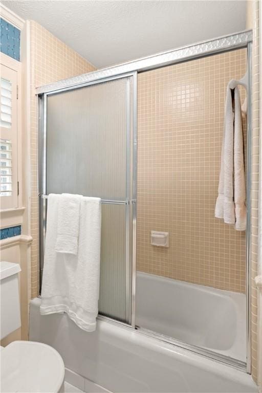 2521 Middle Brook Ln, Auburn, AL 36832 - bathroom with bath / shower combo with glass door and vanity