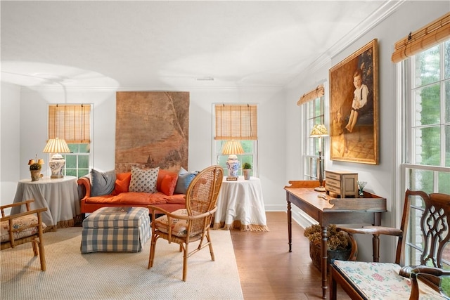 2521 Middle Brook Ln, Auburn, AL 36832 - living room featuring crown molding, healthy amount of natural light, wood finished floors, and arched walkways