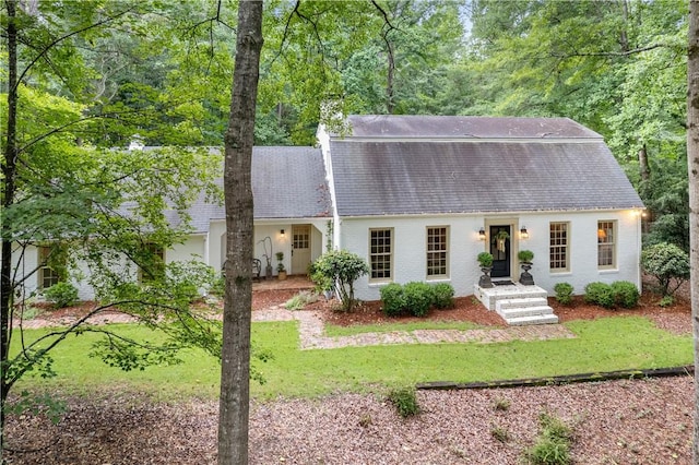 2521 Middle Brook Ln, Auburn, AL 36832 - view of front of house featuring roof with shingles, a front yard, and brick siding
