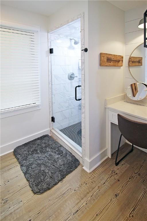 3897 Moores Mill Rd, Auburn, AL 36830 - full bath with a shower stall, wood finished floors, and vanity