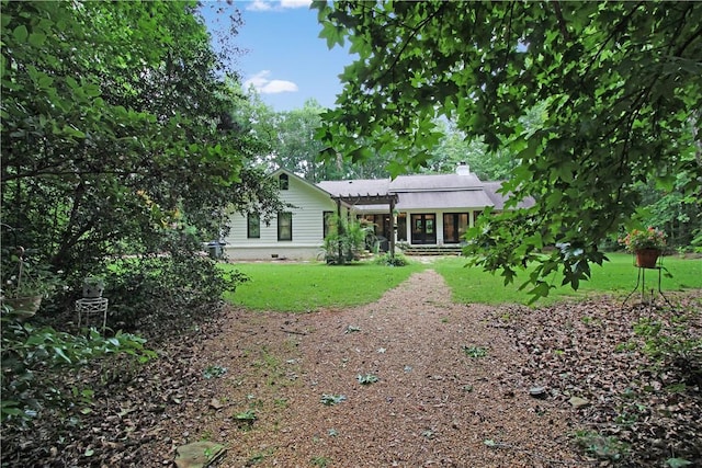 3897 Moores Mill Rd, Auburn, AL 36830 - rear view of property with a chimney and a yard