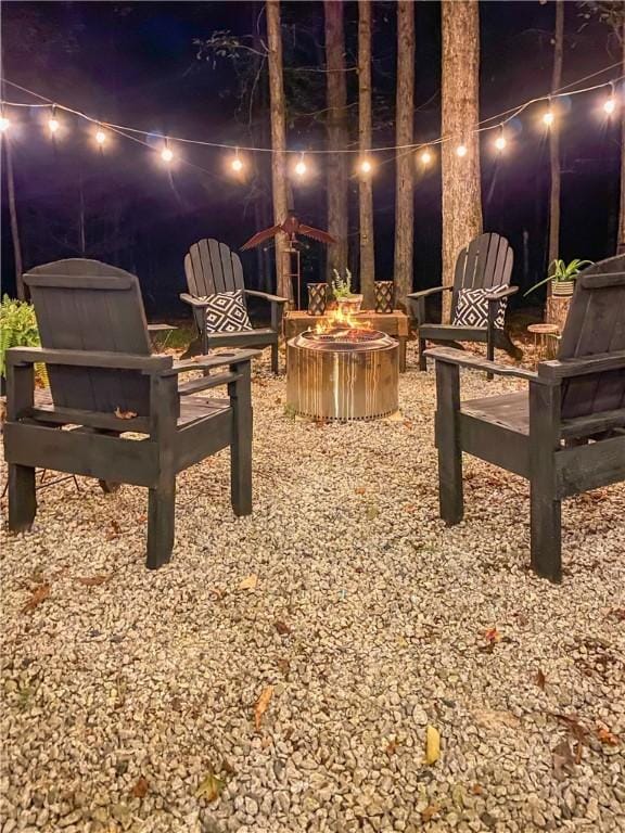 3897 Moores Mill Rd, Auburn, AL 36830 - yard at night featuring an outdoor fire pit