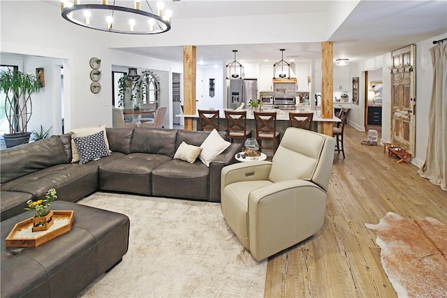 3897 Moores Mill Rd, Auburn, AL 36830 - living area with a chandelier and light wood-type flooring