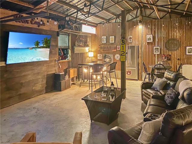 3897 Moores Mill Rd, Auburn, AL 36830 - living room with concrete flooring and vaulted ceiling