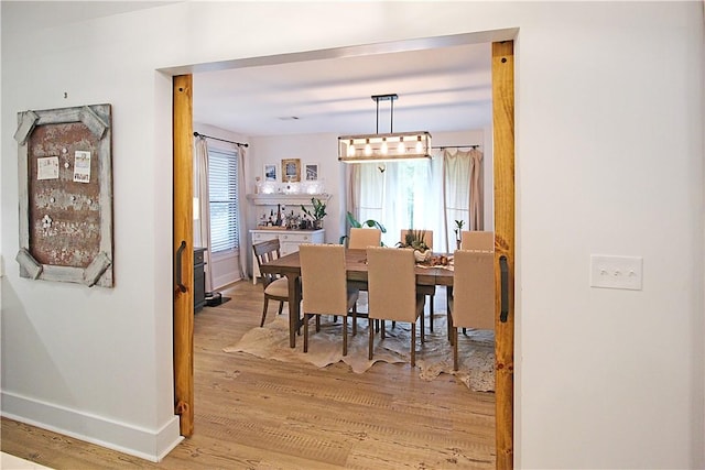 3897 Moores Mill Rd, Auburn, AL 36830 - dining area with light wood-style floors and healthy amount of natural light