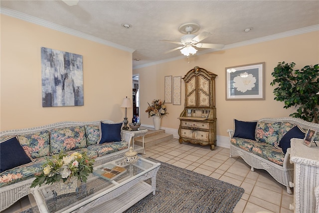 2071 County Road 63, Tuskegee, AL 36083 - living room featuring light tile patterned flooring, ornamental molding, a ceiling fan, and baseboards