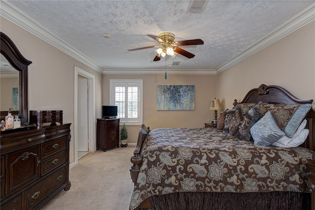 2071 County Road 63, Tuskegee, AL 36083 - bedroom featuring light colored carpet, crown molding, ceiling fan, a textured ceiling, and baseboards