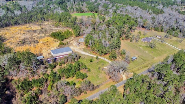 aerial view featuring a view of trees