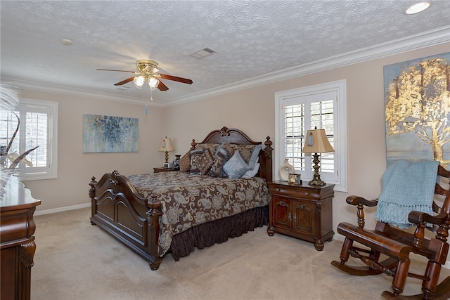 2071 County Road 63, Tuskegee, AL 36083 - bedroom featuring multiple windows, light colored carpet, baseboards, ornamental molding, and a textured ceiling