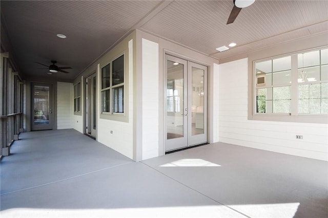 view of patio / terrace featuring french doors and ceiling fan