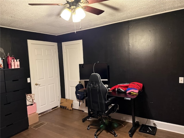 office featuring a textured ceiling, hardwood / wood-style flooring, and ceiling fan