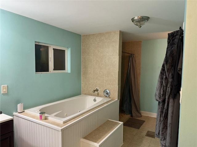 bathroom with tile patterned flooring, vanity, and independent shower and bath