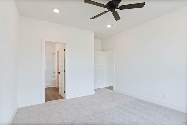 7 Crossing Ct E, Valley, AL 36854 - unfurnished bedroom featuring carpet floors, recessed lighting, ensuite bath, and ceiling fan