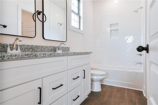 7 Crossing Ct E, Valley, AL 36854 - full bathroom with double vanity, wood finished floors, and shower / bathtub combination