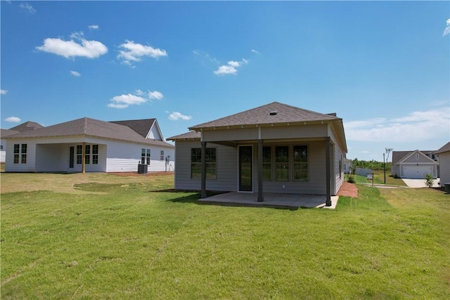 7 Crossing Ct E, Valley, AL 36854 - back of property featuring a patio and a lawn