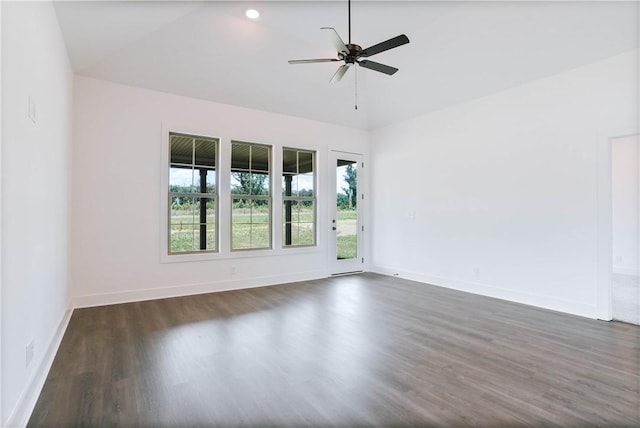 7 Crossing Ct E, Valley, AL 36854 - empty room with dark wood-style flooring, a ceiling fan, and vaulted ceiling