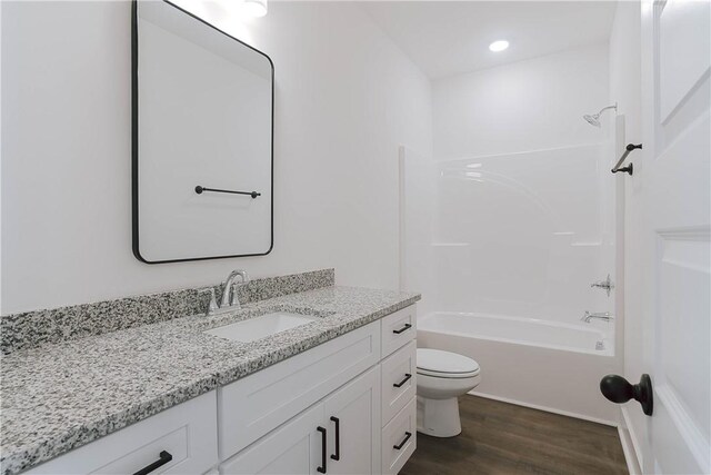 7 Crossing Ct E, Valley, AL 36854 - full bath featuring vanity, wood finished floors, and shower / tub combination