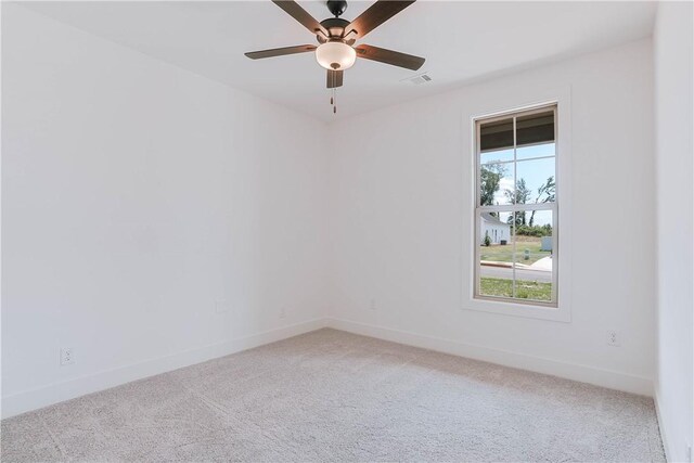 7 Crossing Ct E, Valley, AL 36854 - carpeted empty room featuring baseboards and a ceiling fan