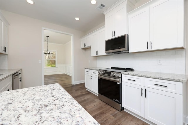 204 Lee Rd Unit 2037, Salem, AL 36874 - kitchen featuring stainless steel appliances, a chandelier, white cabinetry, tasteful backsplash, and light stone counters