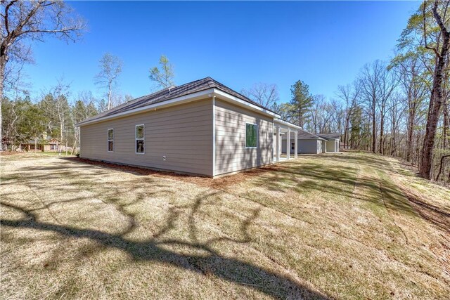 204 Lee Rd Unit 2037, Salem, AL 36874 - back of house featuring a lawn and covered porch